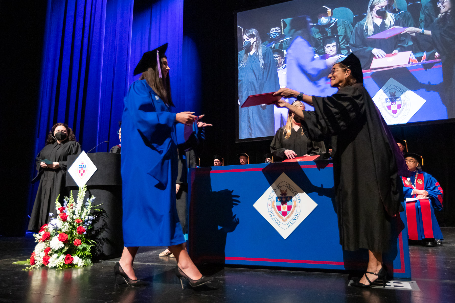 Marta Frankiv, the first graduate of 2022, and the first student to receive a degree in person since 2019, at the DePaul University College of Law commencement ceremony.